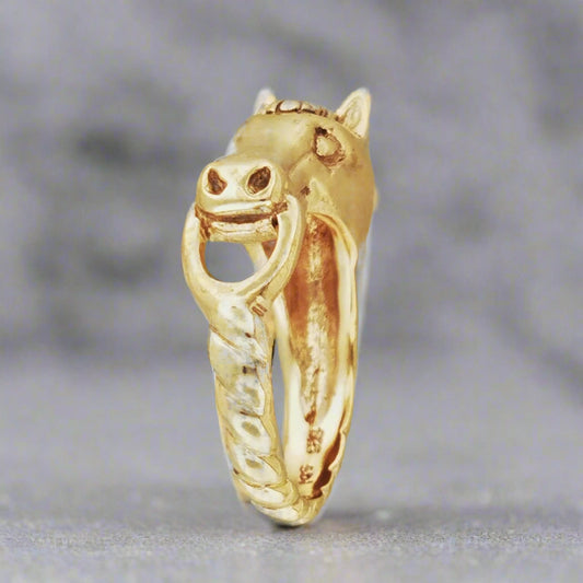 Angled view of 3D horse head ring with bridle in handcrafted antique bronze perfect for horse lover gifts and equestrian statement jewelry