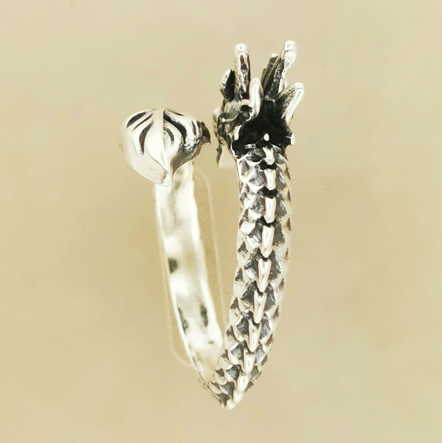 Adjustable Asian Dragon Ring with detailed scales and whiskers in sterling silver, antique bronze, or stainless steel. Handmade fantasy jewellery by Le Dragon Argenté