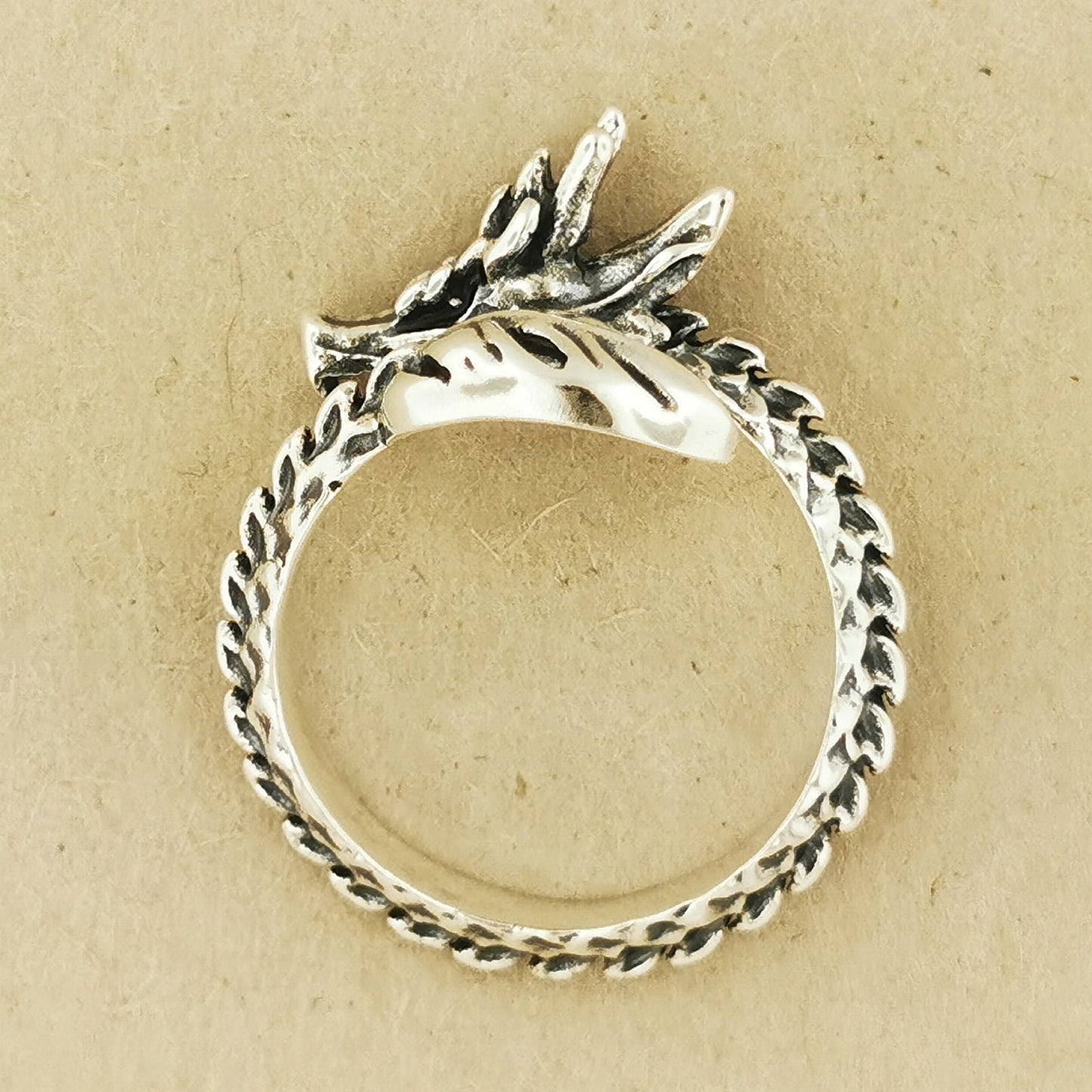 Adjustable Asian Dragon Ring with detailed scales and whiskers in sterling silver, antique bronze, or stainless steel. Handmade fantasy jewellery by Le Dragon Argenté
