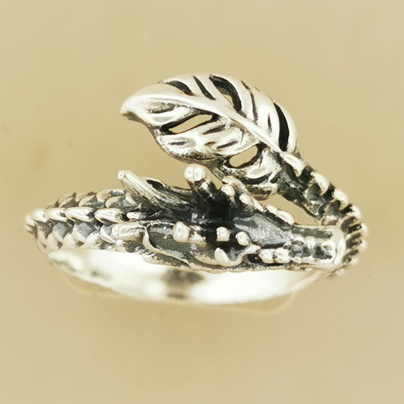Adjustable Asian Dragon Ring with detailed scales and whiskers in sterling silver, antique bronze, or stainless steel. Handmade fantasy jewellery by Le Dragon Argenté