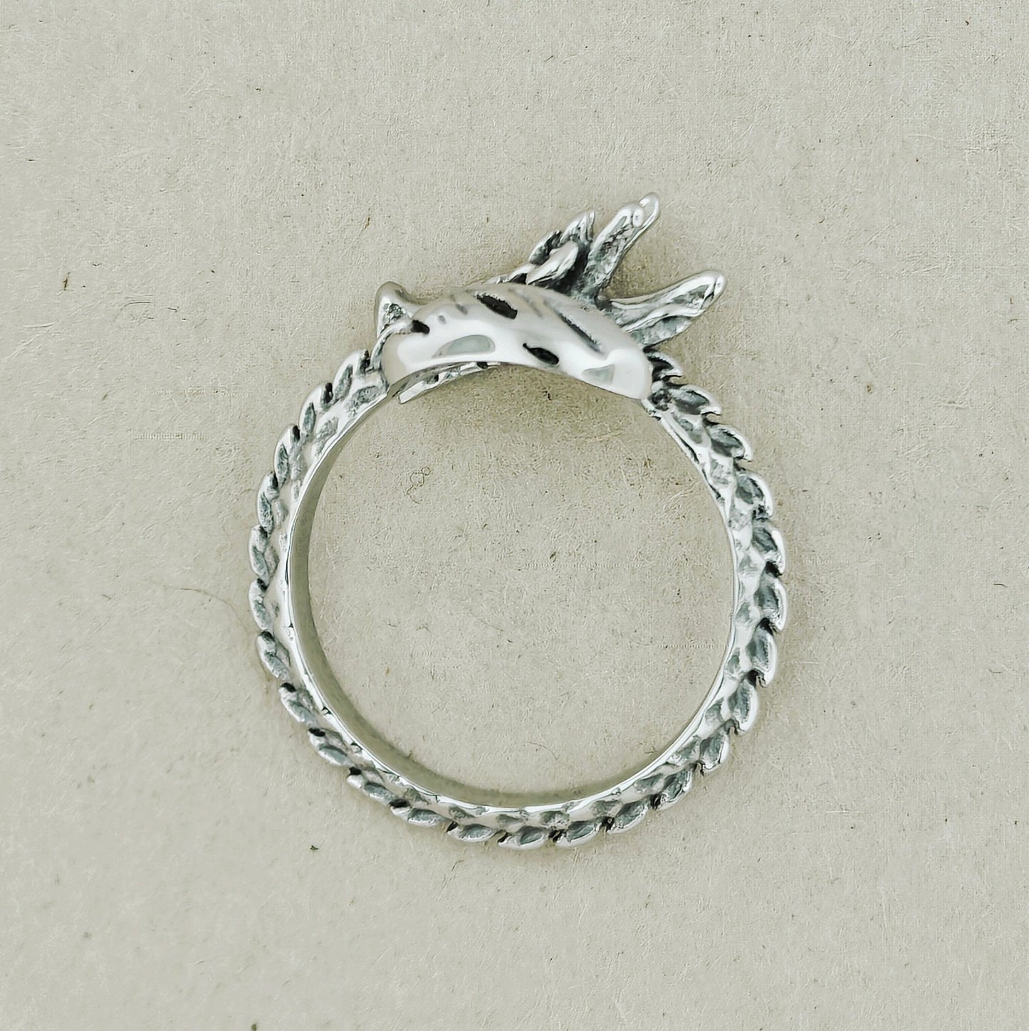 Adjustable Asian Dragon Ring with detailed scales and whiskers in sterling silver, antique bronze, or stainless steel. Handmade fantasy jewellery by Le Dragon Argenté