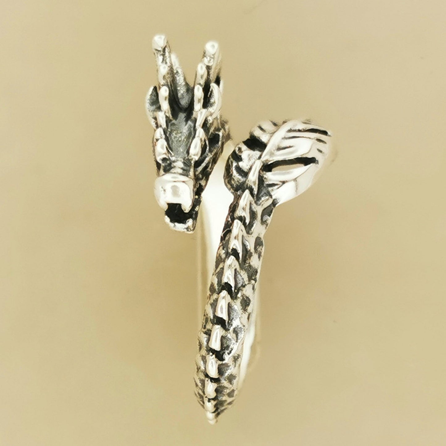 Adjustable Asian Dragon Ring with detailed scales and whiskers in sterling silver, antique bronze, or stainless steel. Handmade fantasy jewellery by Le Dragon Argenté