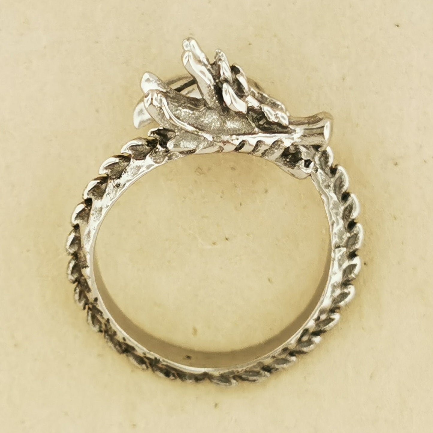 Adjustable Asian Dragon Ring with detailed scales and whiskers in sterling silver, antique bronze, or stainless steel. Handmade fantasy jewellery by Le Dragon Argenté