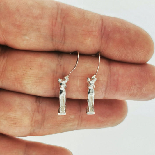 Handcrafted Bastet Cat Charm Earrings in sterling silver, antique bronze, or stainless steel by Le Dragon Argenté. Inspired by the Egyptian goddess Bastet, symbol of protection, joy, and feminine strength. These detailed feline earrings are perfect for mythology lovers, cat enthusiasts, and fans of Egyptian-inspired jewelry with spiritual meaning.