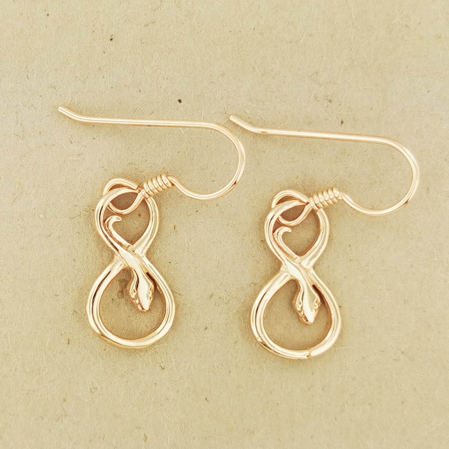 Coiled Snake Charm Earrings in Antique Bronze – Handmade Serpent Jewellery by Le Dragon Argenté