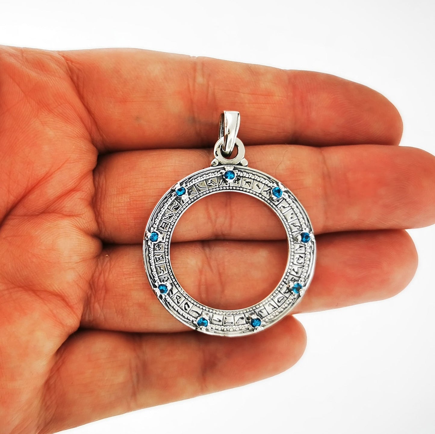 Custom Stargate Pendant in Sterling Silver with December Birthstones In Hand - Le Dragon Argenté