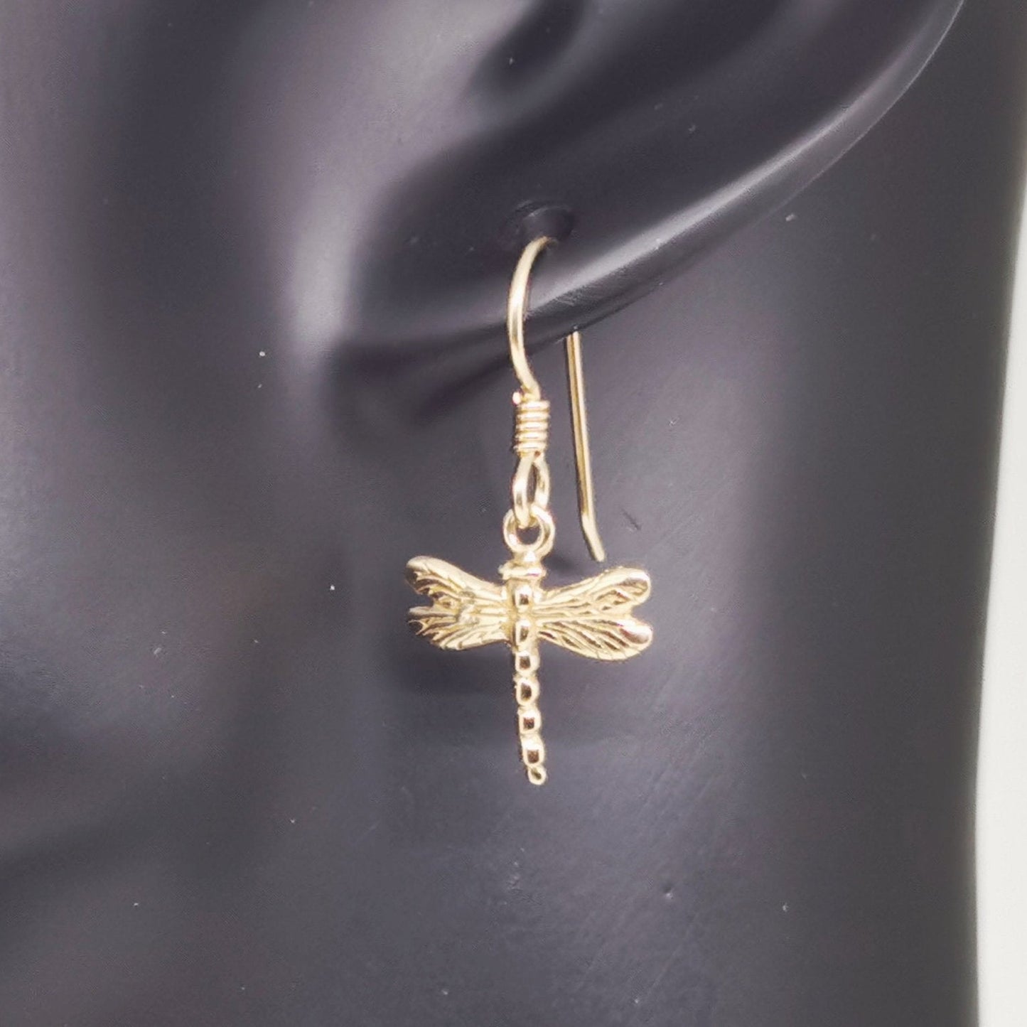 Dragonfly Charm Earrings in Antique Bronze on mannequin - Le Dragon Argenté