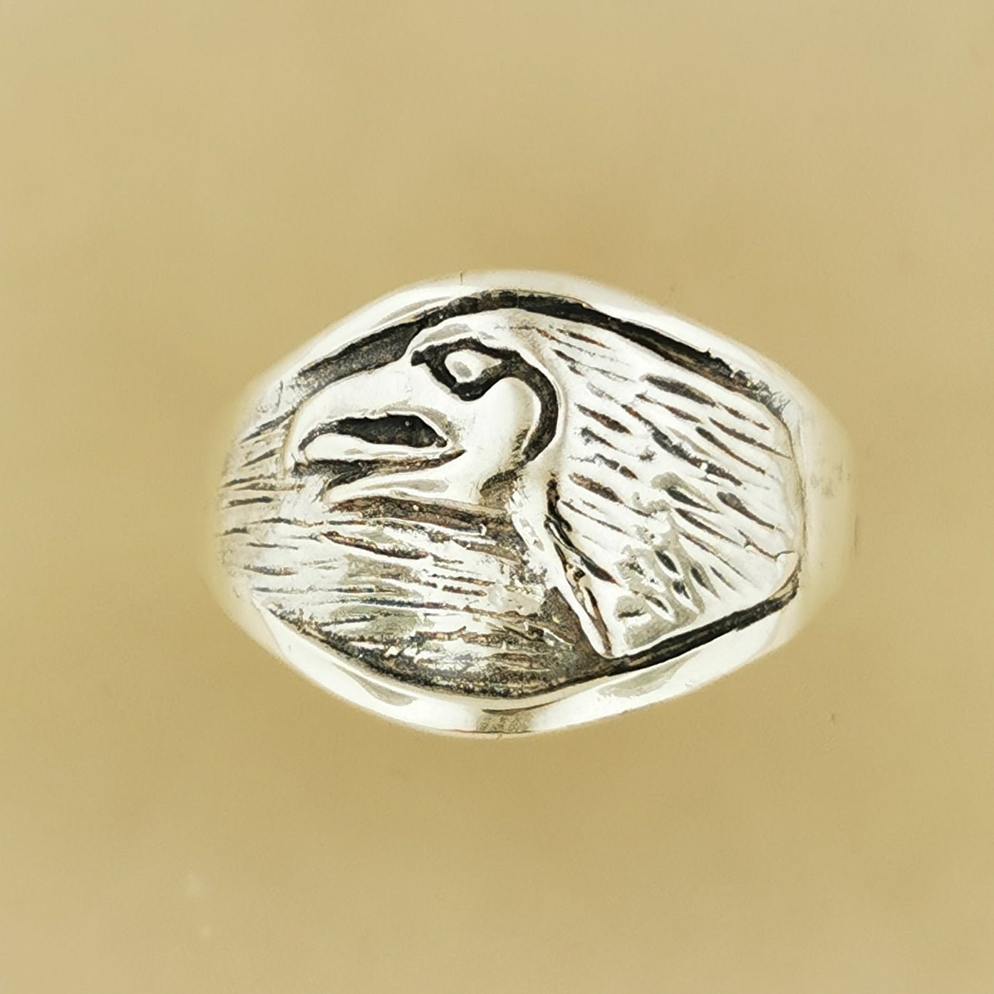 Handcrafted Falcon Head Ring in .925 Sterling Silver featuring detailed feathers and bold avian design by Le Dragon Argenté