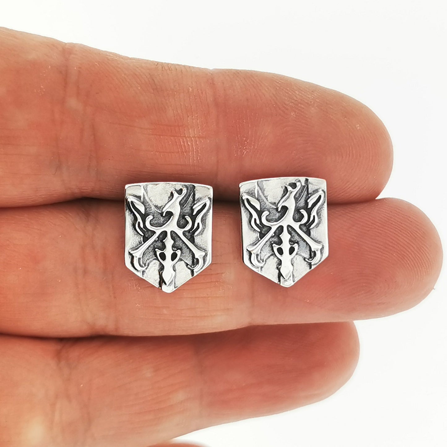 Sterling silver stud earrings inspired by Clive Rosfield’s family crest from Final Fantasy 16, handcrafted gamer jewellery by Le Dragon Argenté.