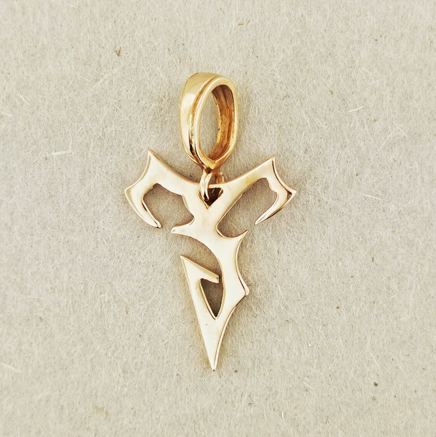 Final Fantasy X Tidus Charm Pendant - Le Dragon Argenté