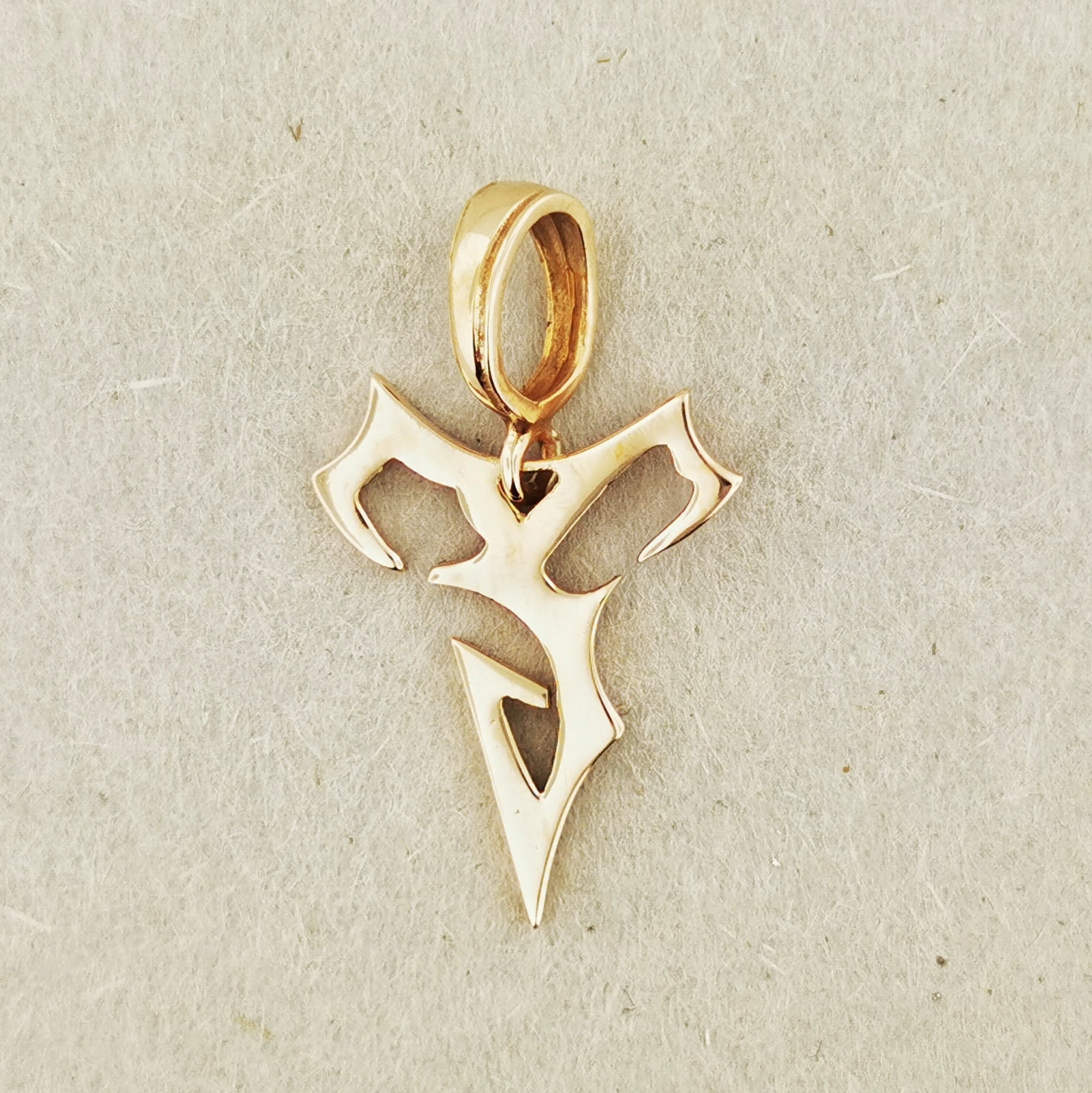 Final Fantasy X Tidus Charm Pendant - Le Dragon Argenté
