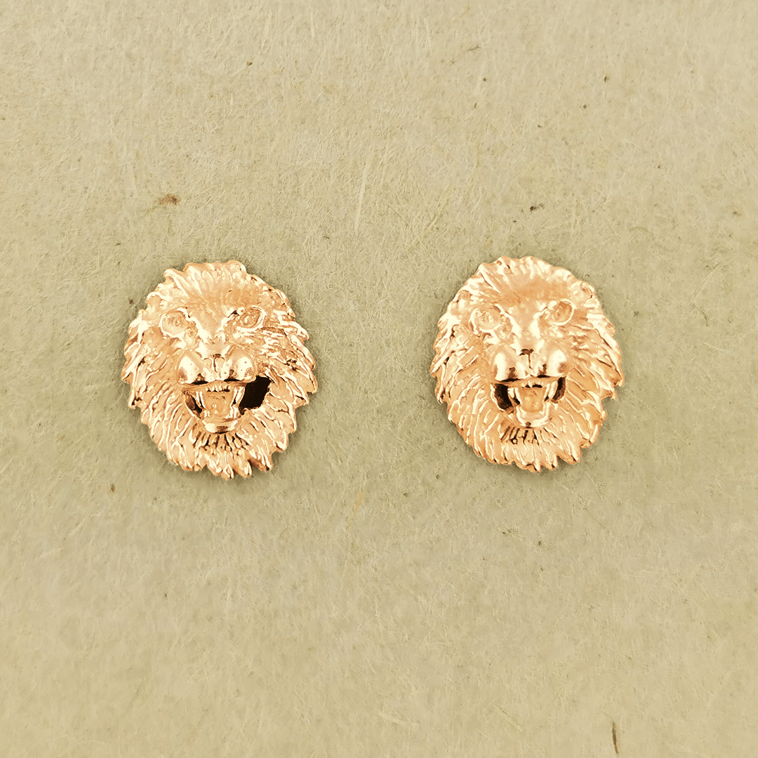 Made-to-order lion head studs by Le Dragon Argenté in solid gold, available in white, pink, or yellow gold and 10k, 14k, or 18k options.