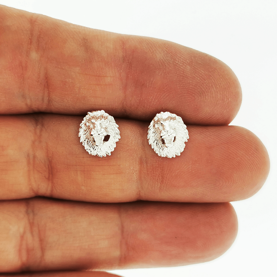 Made-to-order lion head studs by Le Dragon Argenté in solid gold, available in white, pink, or yellow gold and 10k, 14k, or 18k options.