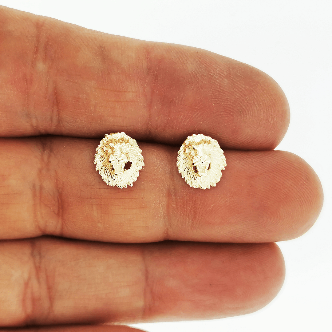 Made-to-order lion head studs by Le Dragon Argenté in solid gold, available in white, pink, or yellow gold and 10k, 14k, or 18k options.