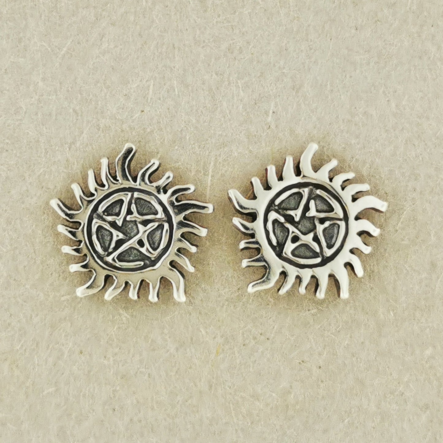 Hunters Pentacle sterling silver stud earrings inspired by dark lore and mystical symbols, handcrafted for fans by Le Dragon Argenté.