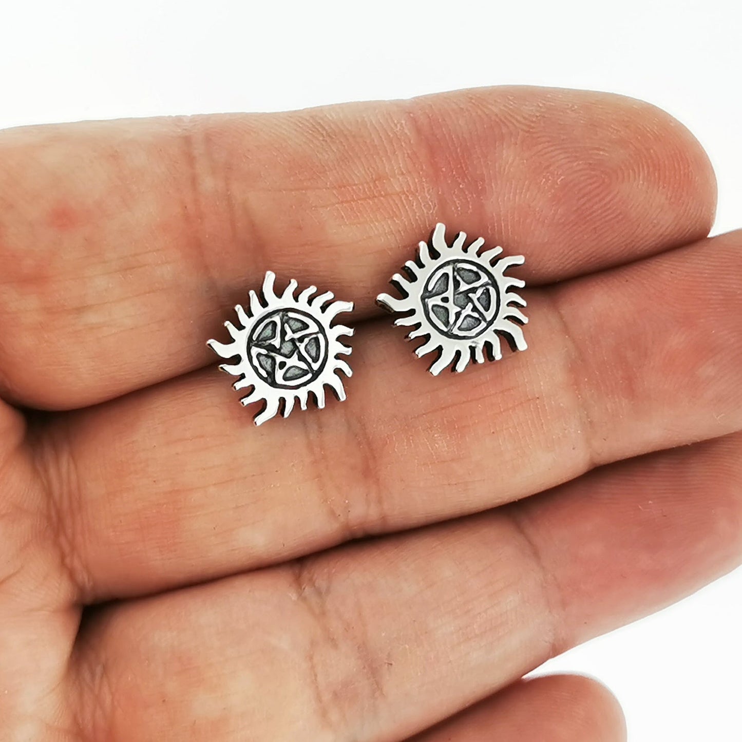 Hunters Pentacle sterling silver stud earrings inspired by dark lore and mystical symbols, handcrafted for fans by Le Dragon Argenté.