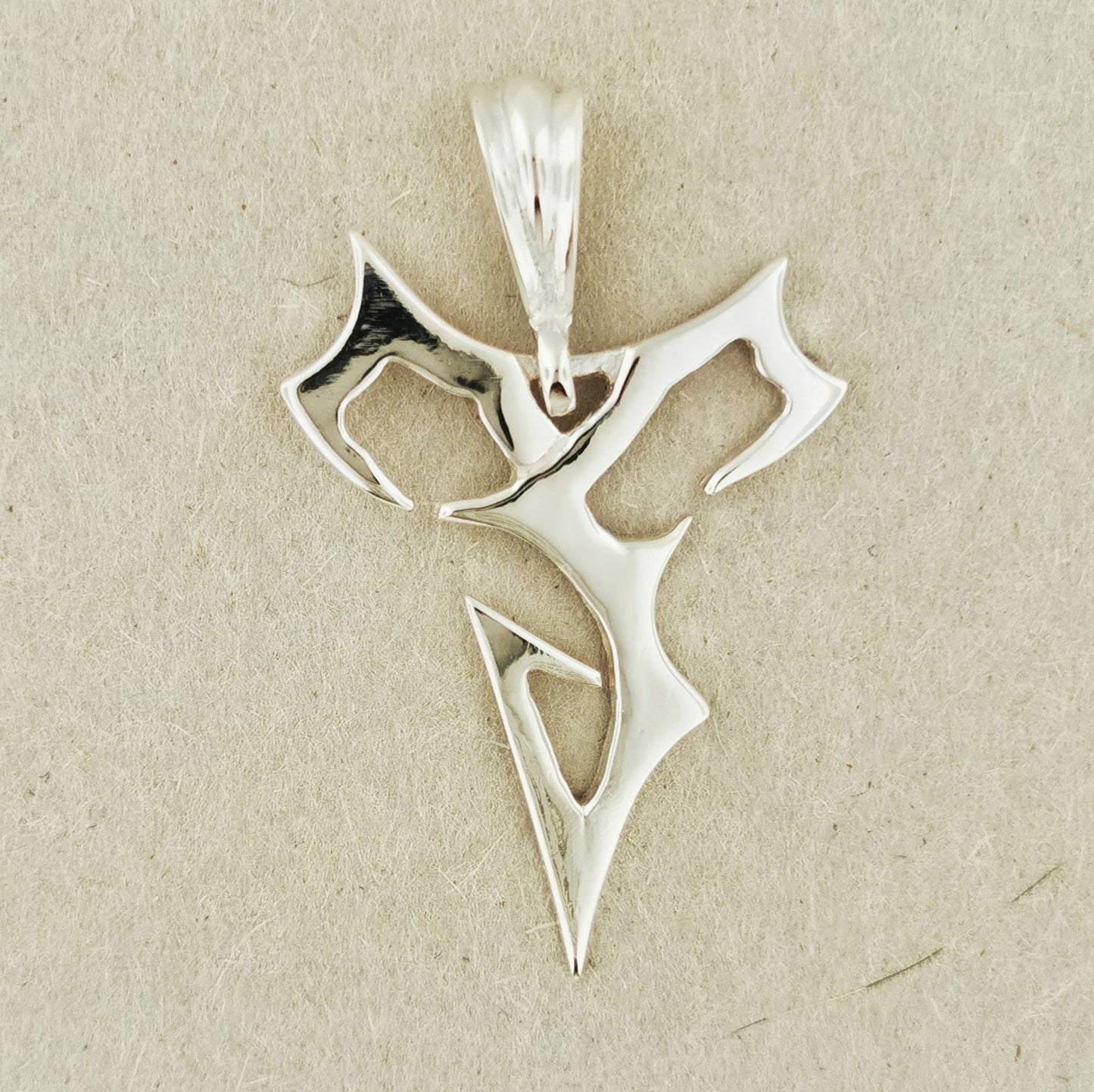 Large Final Fantasy X Tidus Pendant - Le Dragon Argenté