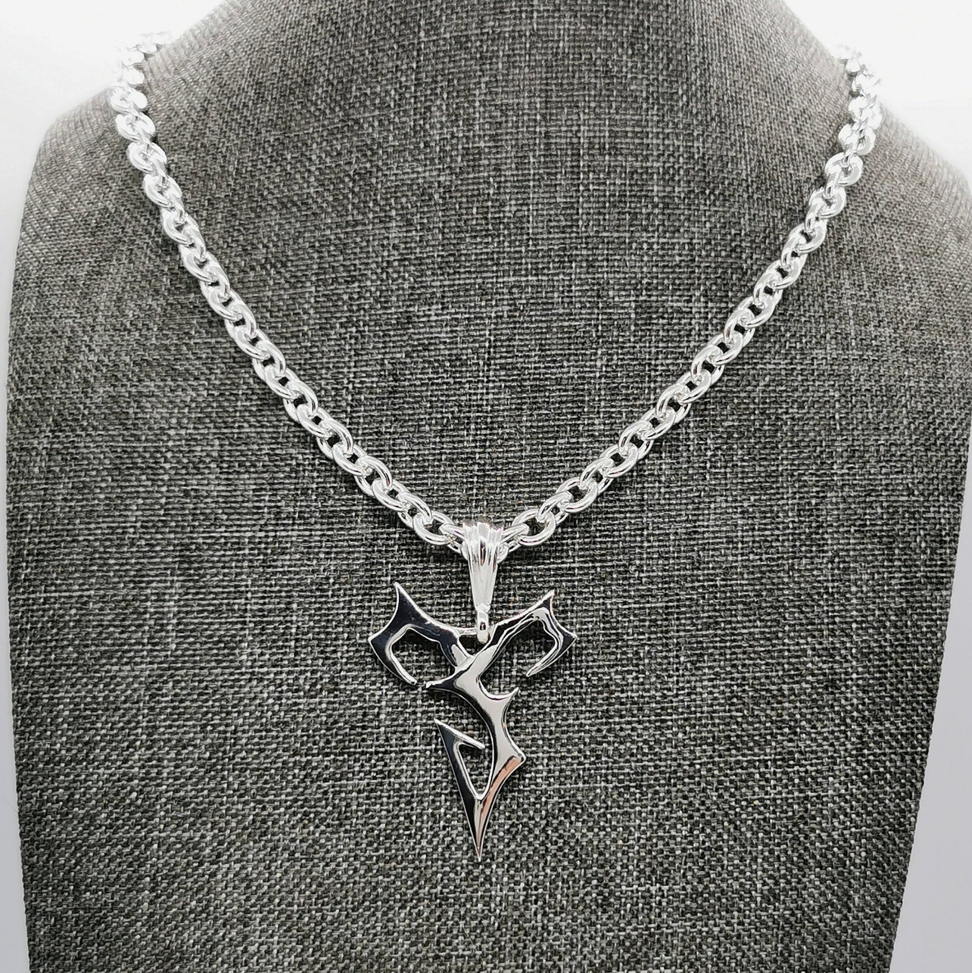 Large Final Fantasy X Tidus Pendant - Le Dragon Argenté