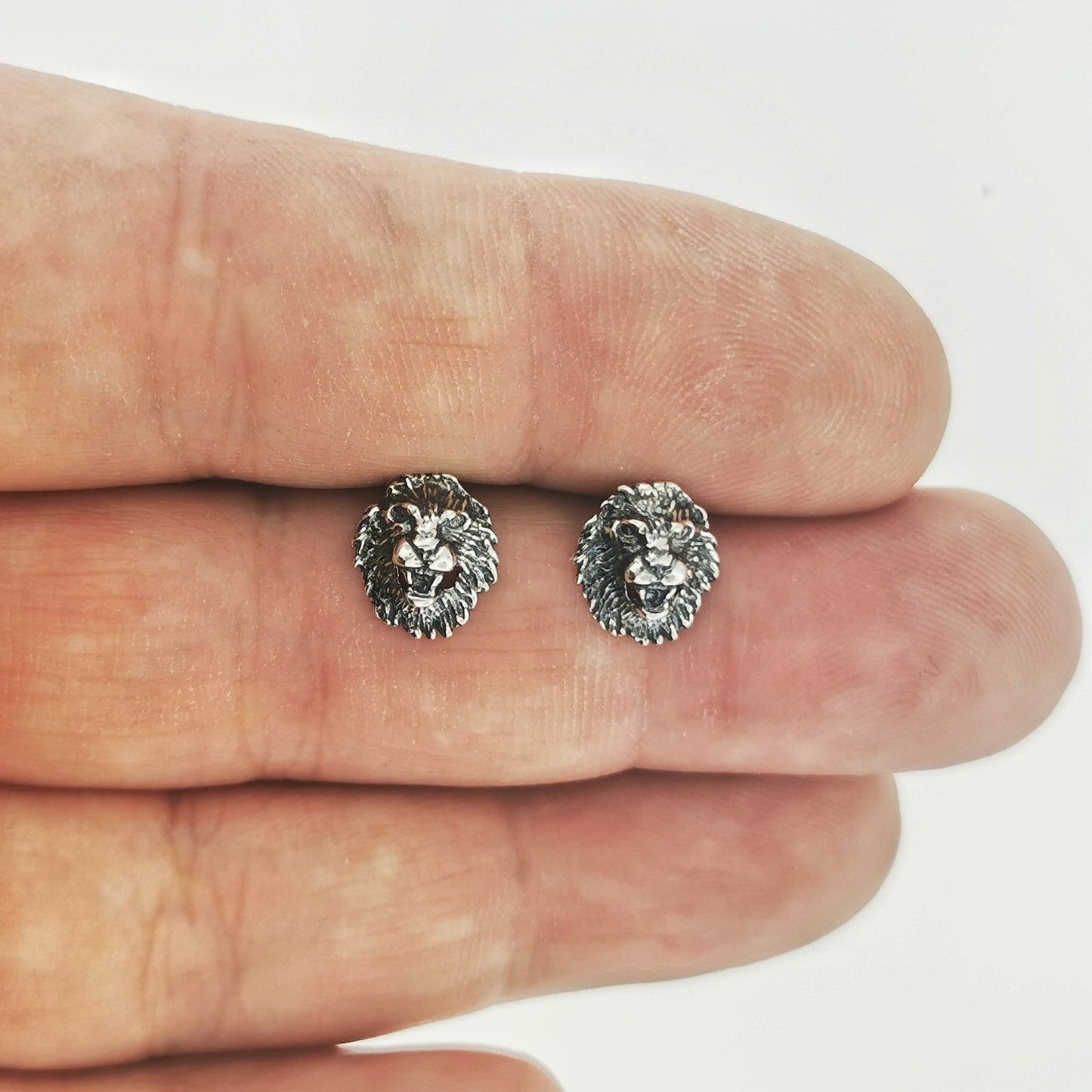 Lion Head Stud Earrings in Sterling Silver by Le Dragon Argenté – bold and detailed feline design perfect for fantasy and animal lovers seeking fierce style.