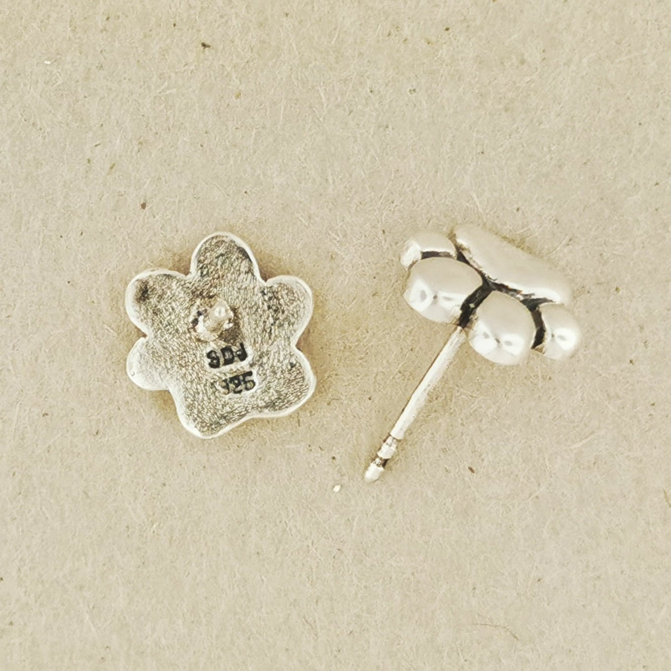 Handmade sterling silver paw print stud earrings – pet lover jewelry by Le Dragon Argenté