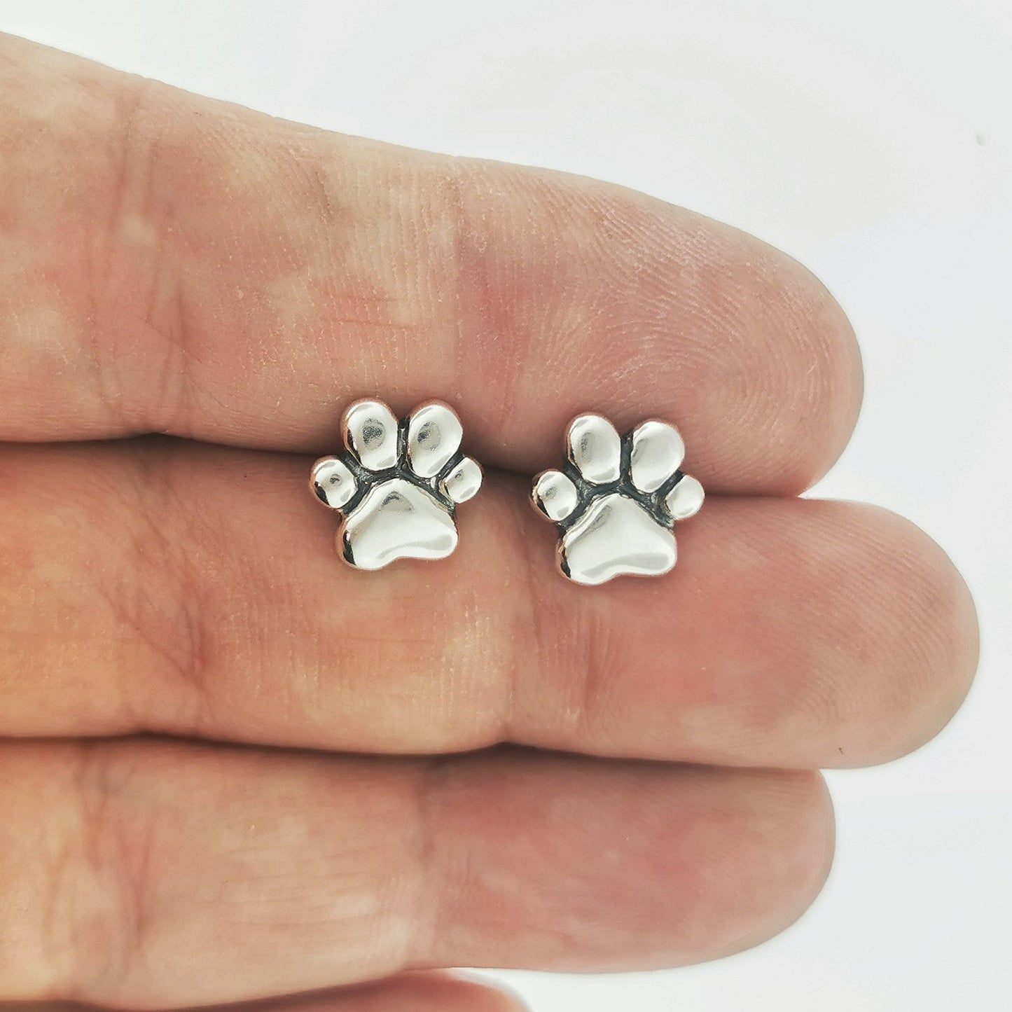 Handmade sterling silver paw print stud earrings – pet lover jewelry by Le Dragon Argenté