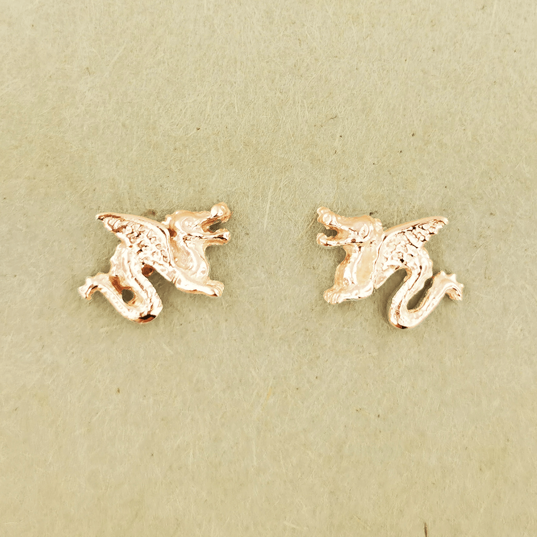 Made-to-order small dragon stud earrings in 10k, 14k, or 18k yellow, pink, or white solid gold by Le Dragon Argenté