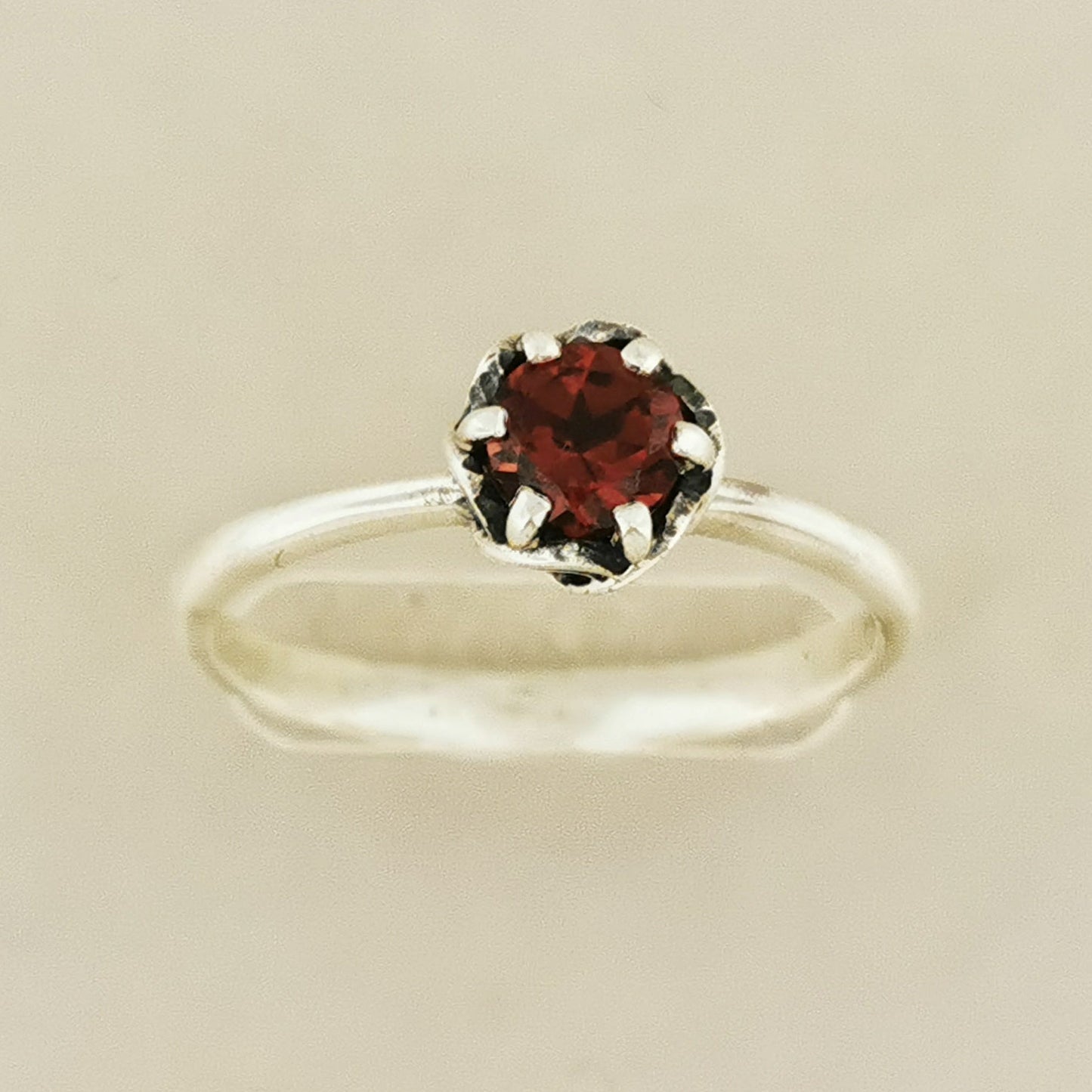 Handmade Solitaire Ring in .925 Sterling Silver with a 5mm coloured cubic zirconia birthstone set in a 6-prong solitaire style and delicate scrollwork design. Perfect gift or promise ring for her, elegant, timeless, and handcrafted by Le Dragon Argenté in Montreal, Canada.