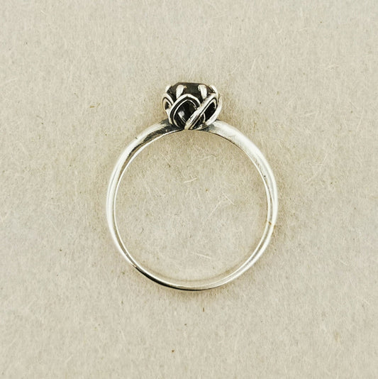Handmade Solitaire Ring in .925 Sterling Silver with a 5mm coloured cubic zirconia birthstone set in a 6-prong solitaire style and delicate scrollwork design. Perfect gift or promise ring for her, elegant, timeless, and handcrafted by Le Dragon Argenté in Montreal, Canada.