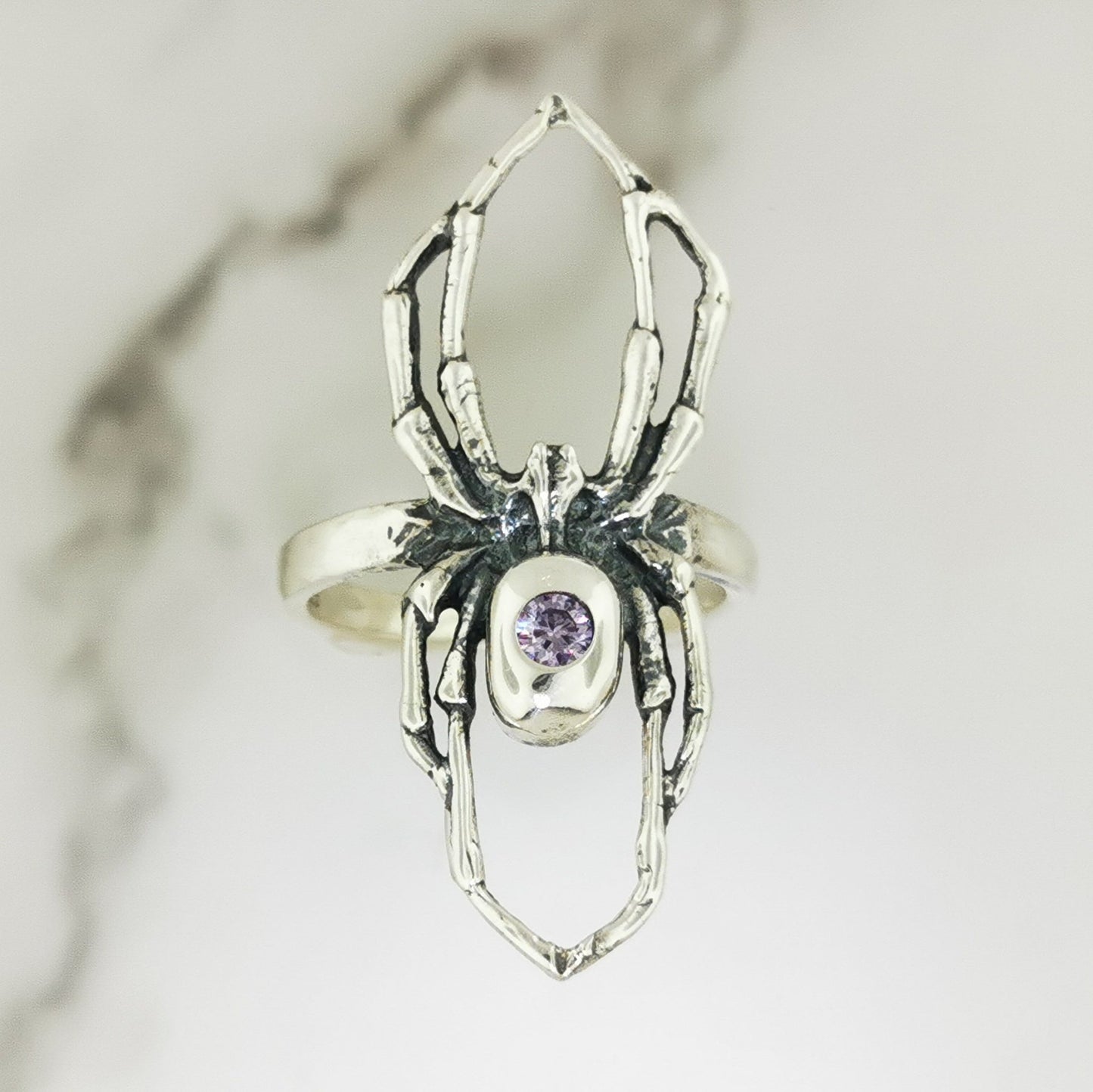Handcrafted sterling silver spider ring with February birthstone CZ gothic 3D design perfect for fans of gothic fashion Halloween or witchy jewelry.- Le Dragon Argenté
