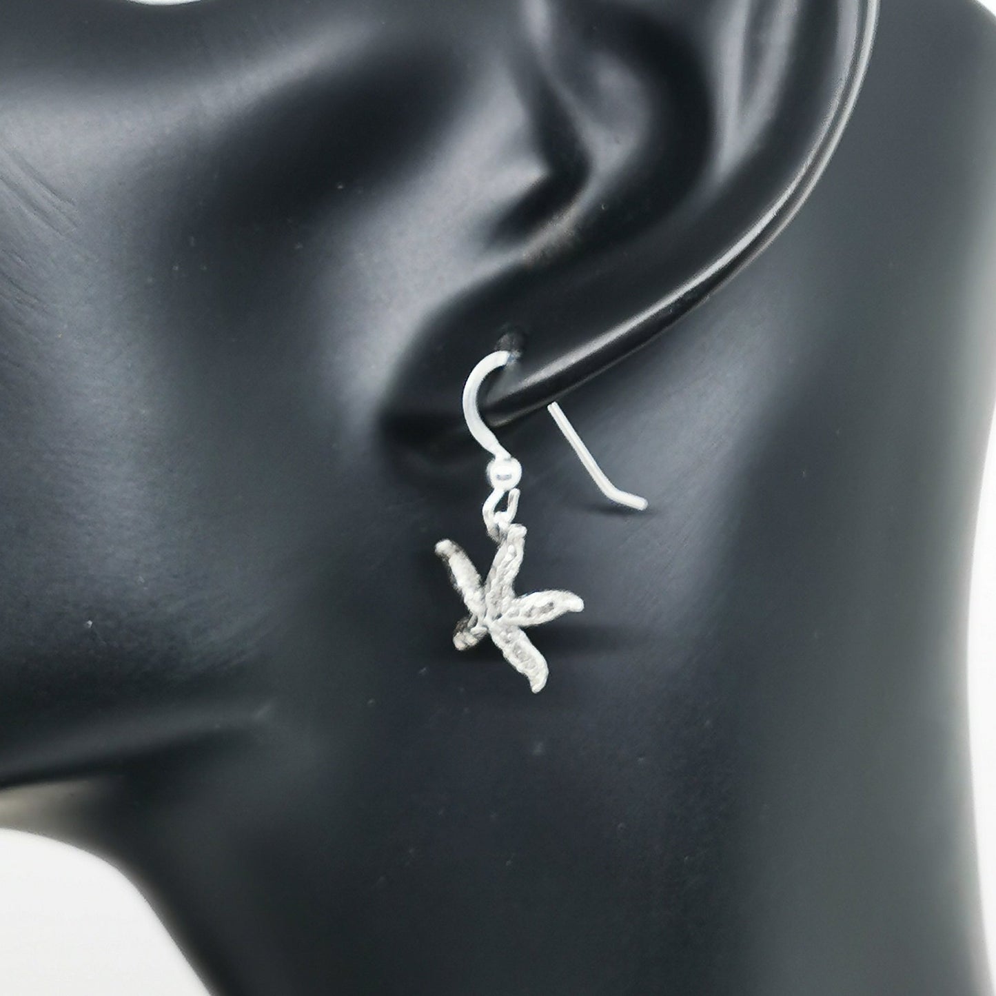 Starfish Charm Earrings In Sterling Silver by Le Dragon Argenté