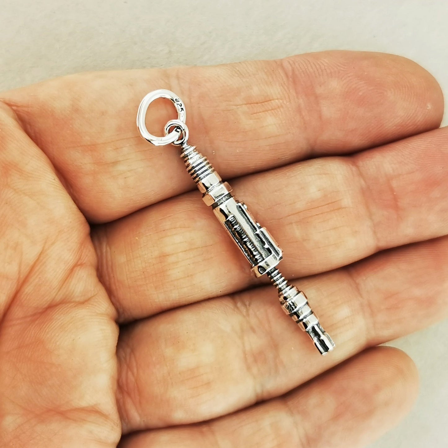 The Master's Sonic Screwdriver Pendant in Sterling Silver In Hand - Le Dragon Argenté