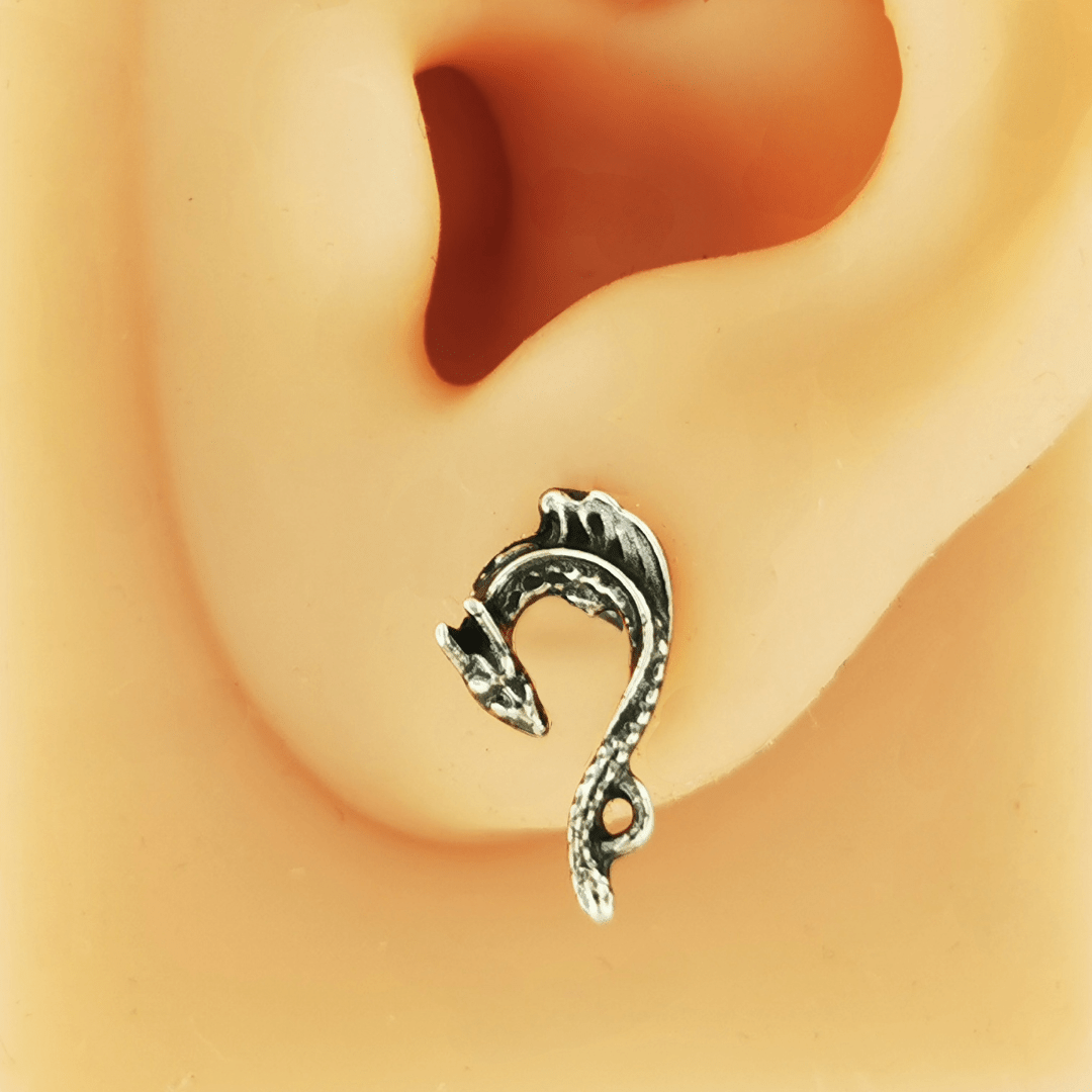 Tiny dragon stud earrings in sterling silver by Le Dragon Argenté – detailed miniature dragon jewellery perfect for subtle fantasy flair and everyday wear.