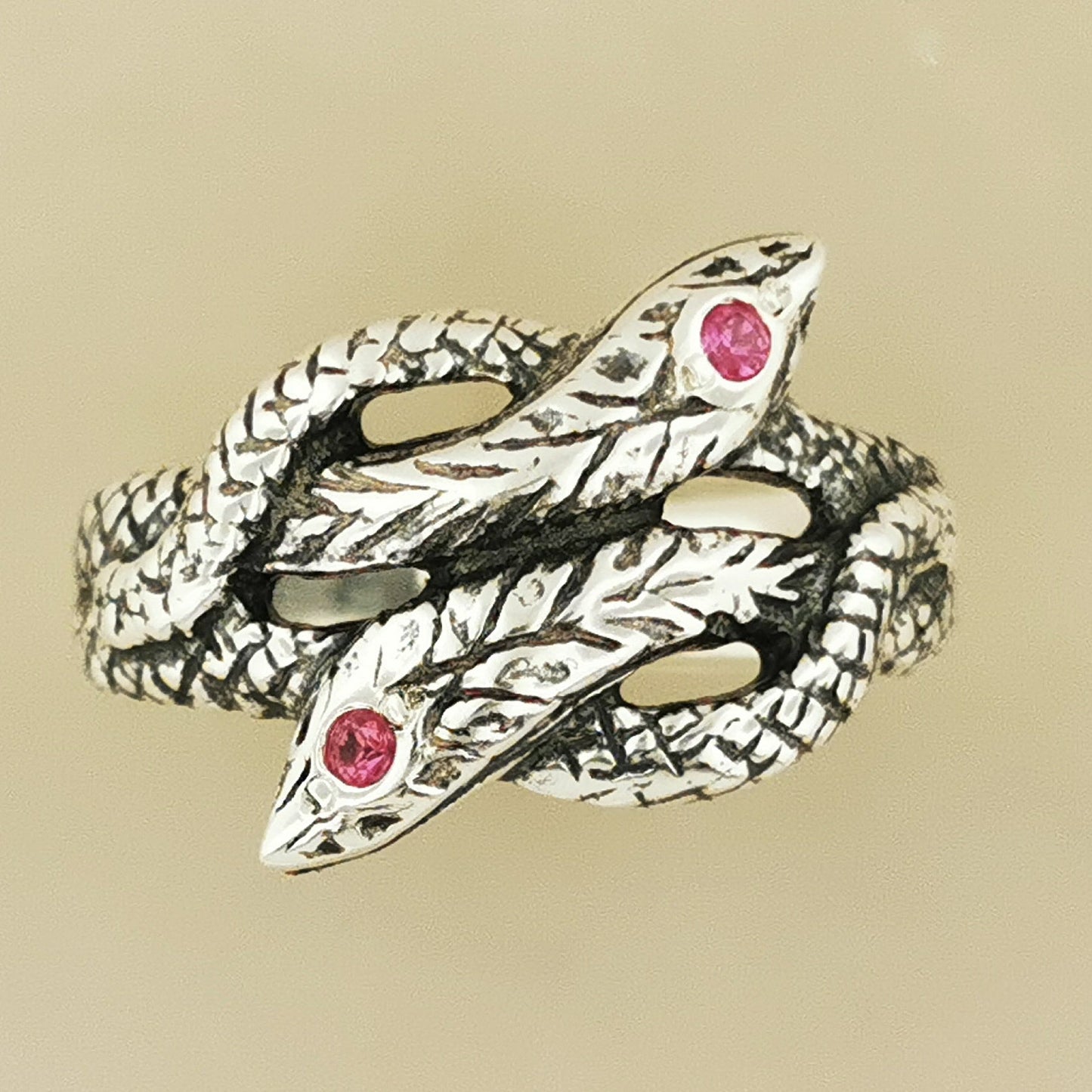 Twin Coiled Snakes Ring with July Birthstone in Sterling Silver - Le Dragon Argenté