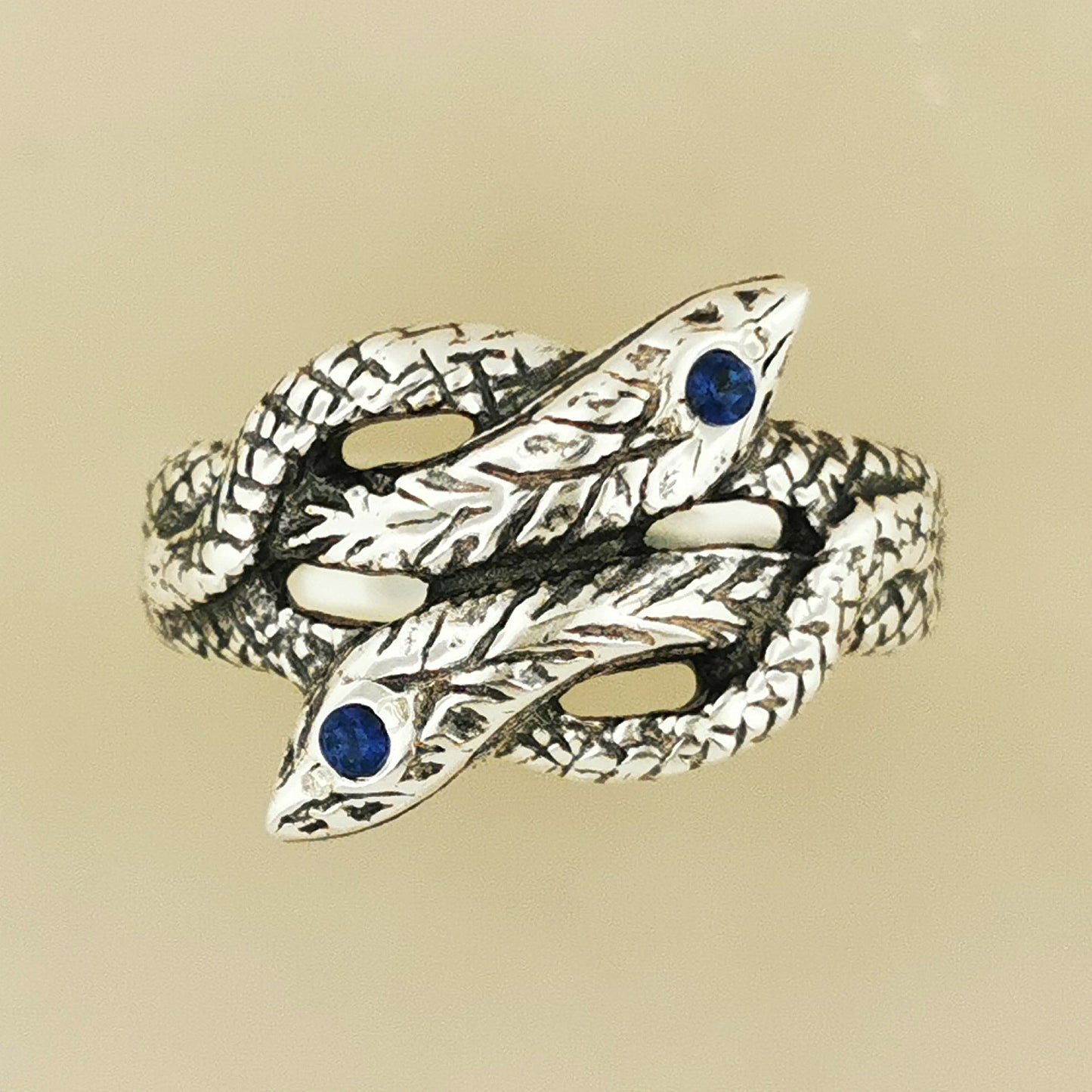 Twin Coiled Snakes Ring with September Birthstone in Sterling Silver - Le Dragon Argenté