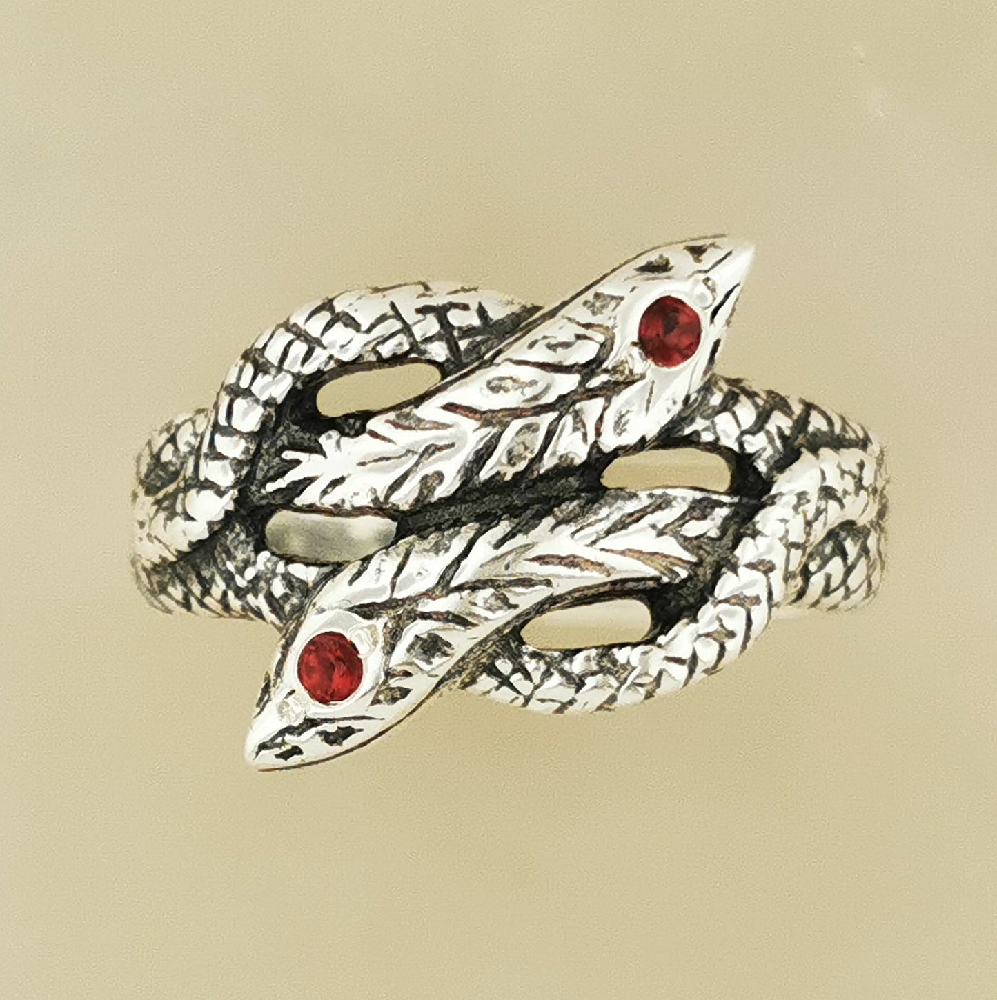 Twin Coiled Snakes Ring with January Birthstone in Sterling Silver - Le Dragon Argenté