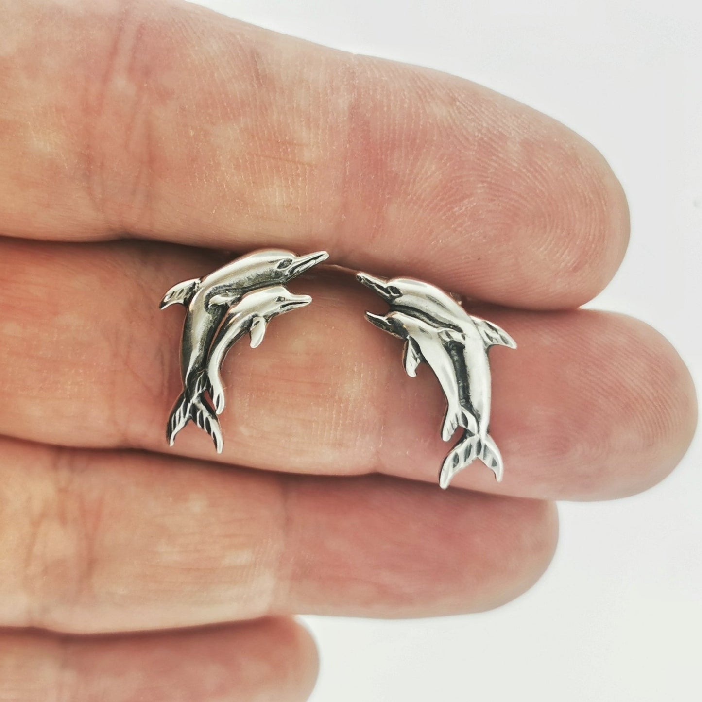 Sterling silver two dolphins stud earrings by Le Dragon Argenté – playful ocean-inspired jewellery for marine animal lovers.