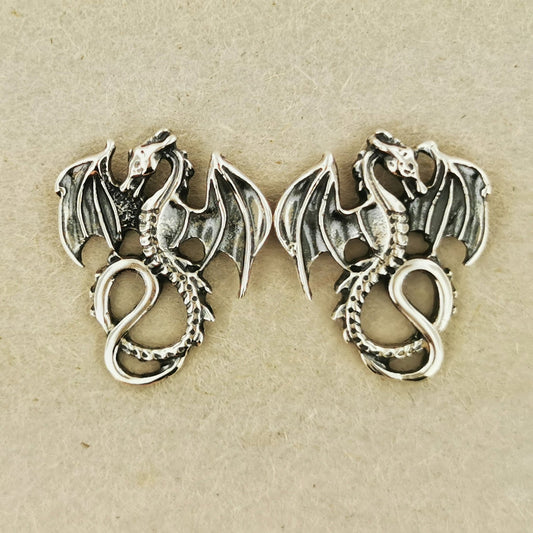 Winged dragon stud earrings in solid sterling silver from Le Dragon Argenté – dragon jewellery for fantasy fans and bold style lovers.