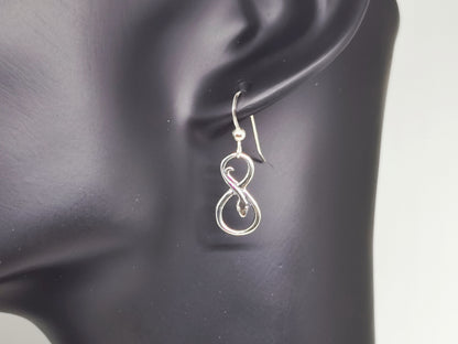 dangle coiled snake charm earring in sterling silver