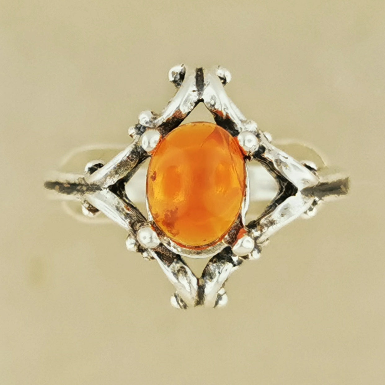 1950s scroll work style ring in sterling silver with Fire Opal cabochon, silver gemstone ring, retro silver ring, mid century silver ring, mid century gemstone ring, retro gemstone ring, silver engagement ring, gemstone engagement ring, sterling silver gemstone ring, silver gemstone wedding ring, sterling silver wedding ring, retro wedding ring, silver retro wedding ring, gemstone promise ring, vintage gemstone ring, vintage silver ring, vintage sterling silver gemstone ring, silver scrollwork ring