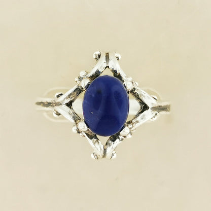 1950s scroll work style ring in sterling silver with lapis lazuli cabochon, silver gemstone ring, retro silver ring, mid century silver ring, mid century gemstone ring, retro gemstone ring, silver engagement ring, gemstone engagement ring, sterling silver gemstone ring, silver gemstone wedding ring, sterling silver wedding ring, retro wedding ring, silver retro wedding ring, gemstone promise ring, vintage gemstone ring, vintage silver ring, vintage sterling silver gemstone ring, silver scrollwork ring