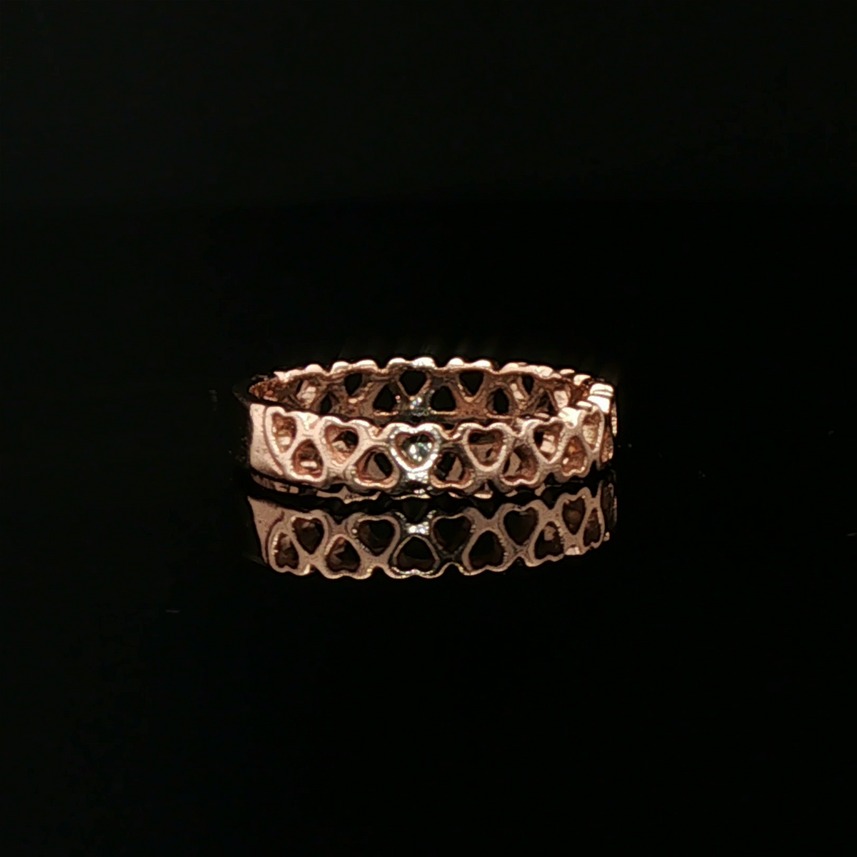 Connected Hearts Band Ring in antique bronze with linked heart design by Le Dragon Argenté