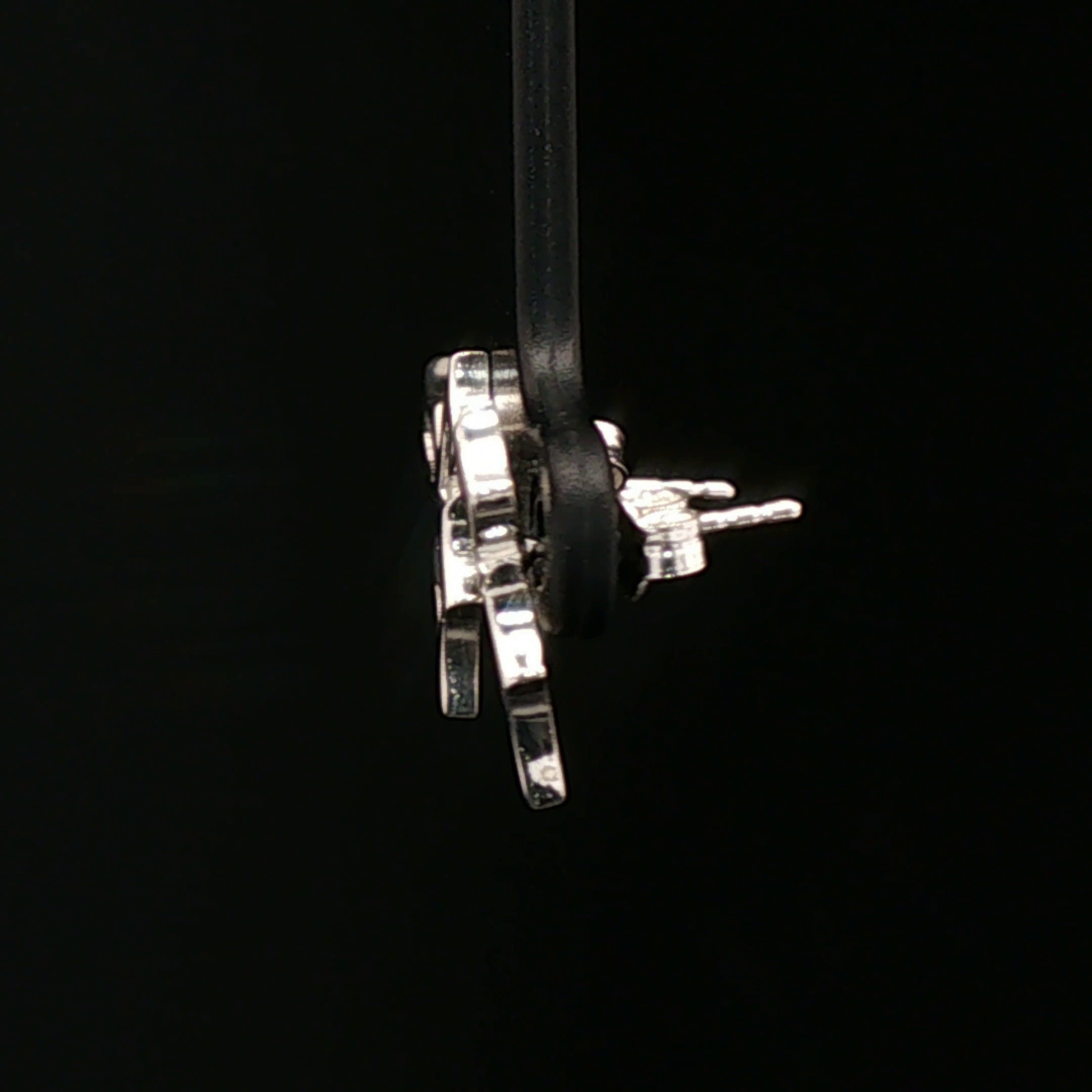 Sterling silver stud earrings inspired by Tidus from Final Fantasy X, handmade by Le Dragon Argenté – perfect gamer jewellery for FFX fans.