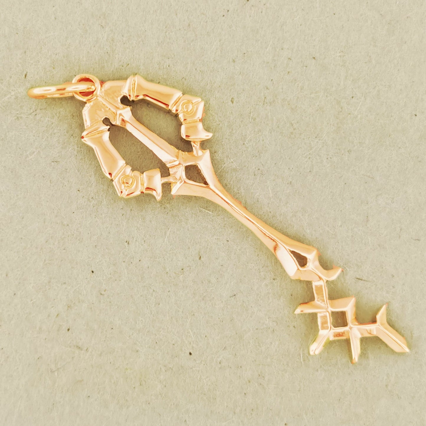 Kingdom Hearts Rainfell Keyblade Pendant in Pink Gold, Gold Key Pendant, Gold Keyblade Pendant, KH Keyblade Pendant, Gold KH Pendant, Gold Kingdom Hearts Keyblade, Gold Kingdom Hearts Keyblade Pendant, Kingdom Hearts Jewelry, Kindom Hearts Jewellery, Gamer Geek Jewelry, Gamer Geek Jewellery, Gold Gamer Pendant, Gold Rainfell Keyblade Pendant, Video Game Jewelry, Video Game Pendant