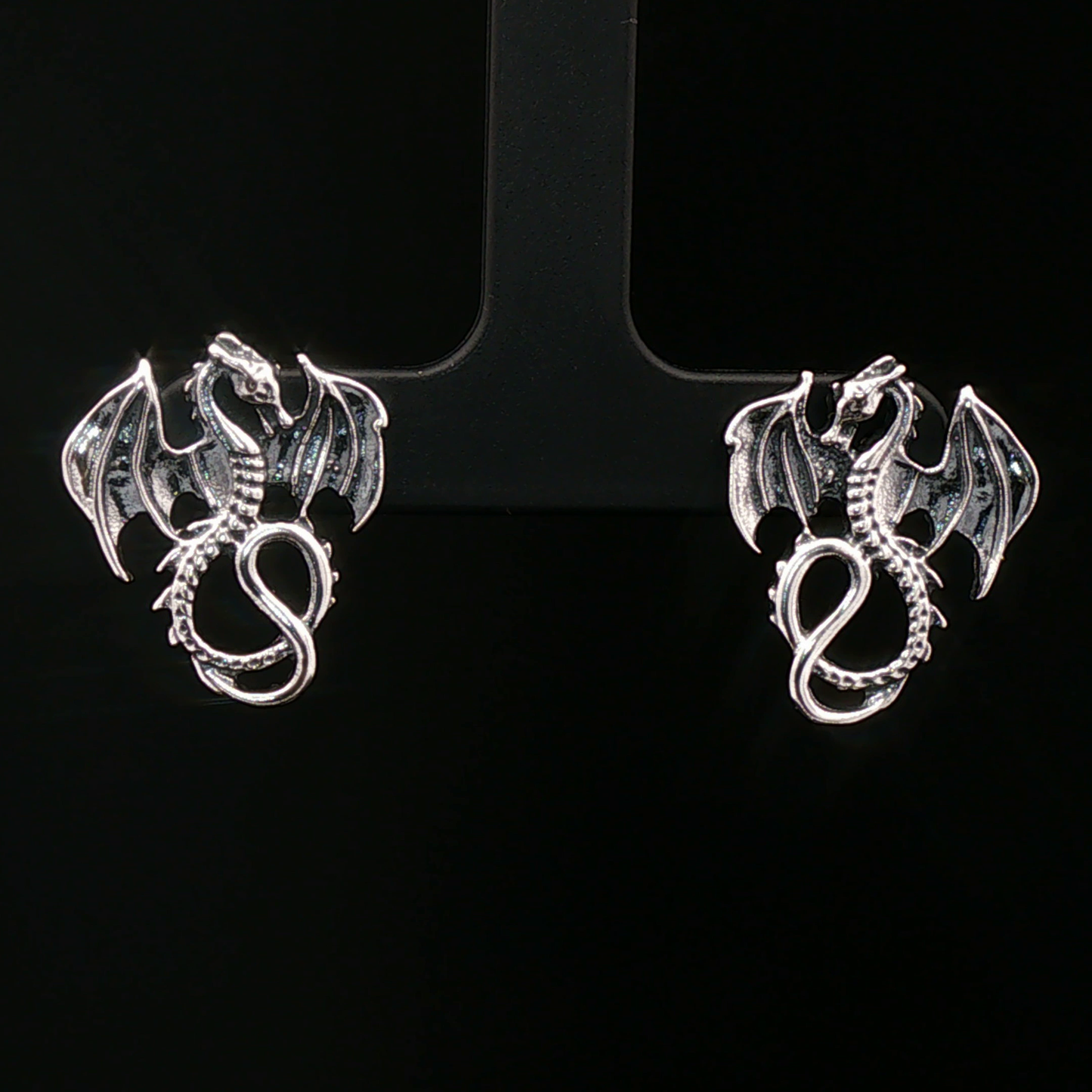 Winged dragon stud earrings in solid sterling silver from Le Dragon Argenté – dragon jewellery for fantasy fans and bold style lovers.