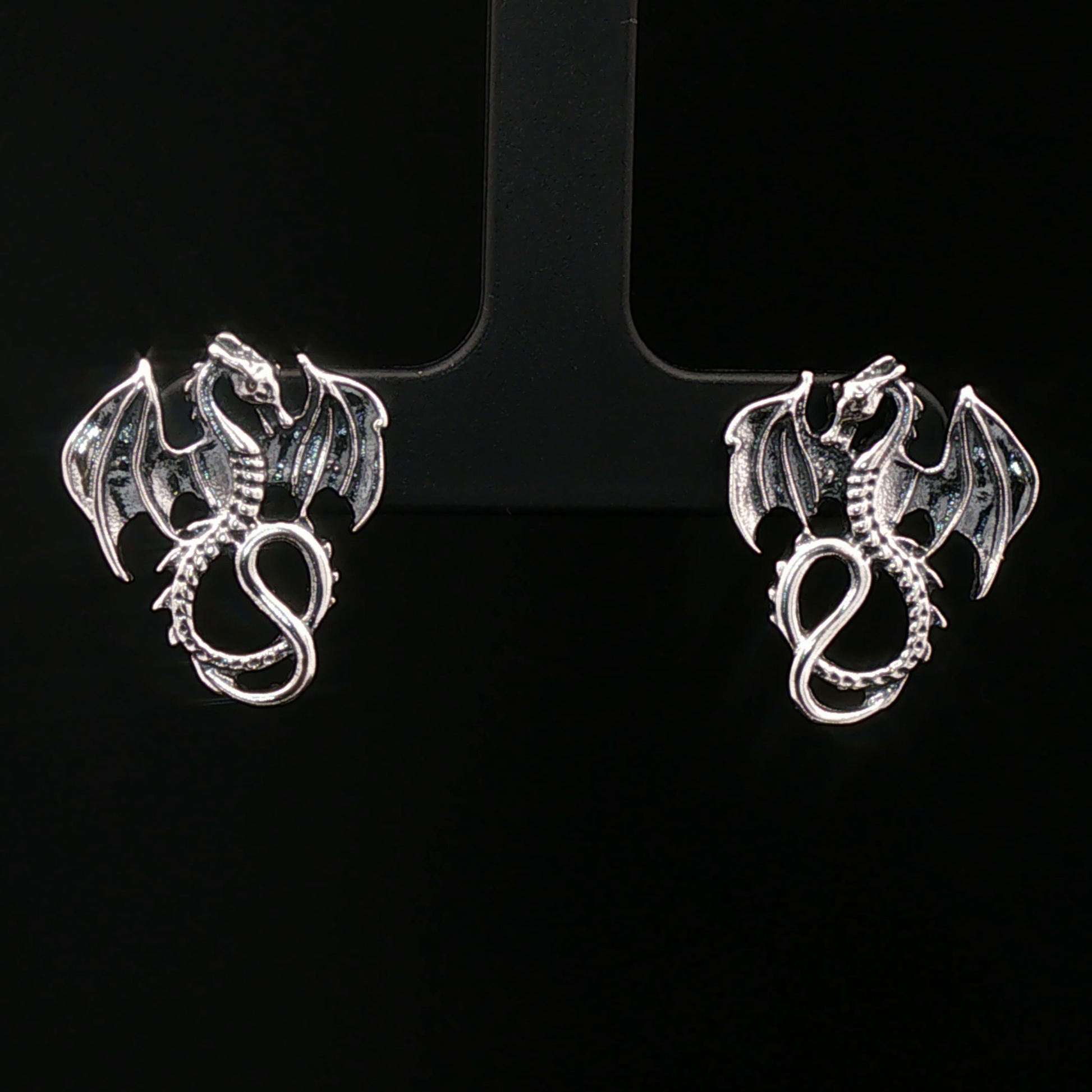 Winged dragon stud earrings in solid sterling silver from Le Dragon Argenté – dragon jewellery for fantasy fans and bold style lovers.