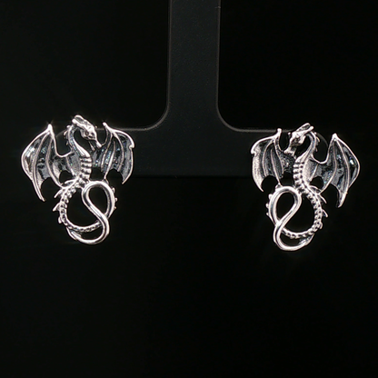 Winged dragon stud earrings in solid sterling silver from Le Dragon Argenté – dragon jewellery for fantasy fans and bold style lovers.