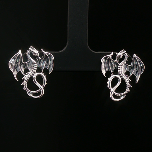 Winged dragon stud earrings in solid sterling silver from Le Dragon Argenté – dragon jewellery for fantasy fans and bold style lovers.