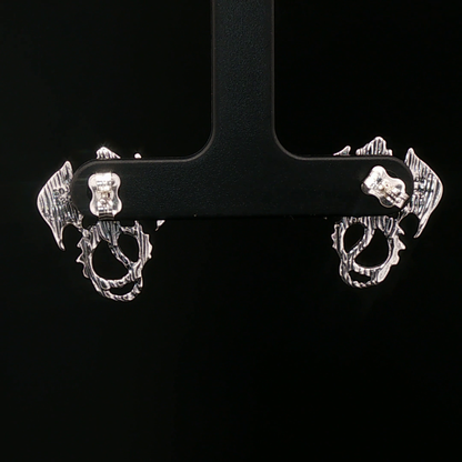 Winged dragon stud earrings in solid sterling silver from Le Dragon Argenté – dragon jewellery for fantasy fans and bold style lovers.