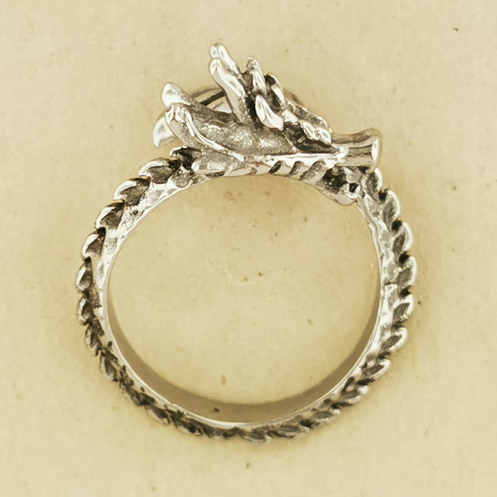 Adjustable Asian Dragon Ring with detailed scales and whiskers in sterling silver, antique bronze, or stainless steel. Handmade fantasy jewellery by Le Dragon Argenté