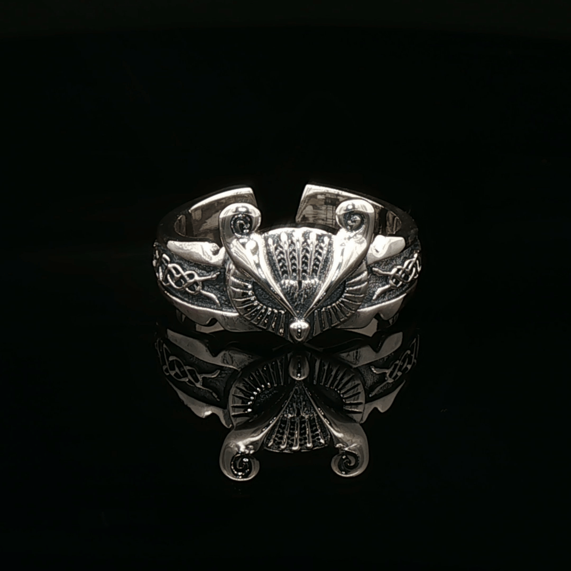 Adjustable Celtic owl ring in sterling silver with detailed knotwork and owl design by Le Dragon Argenté.